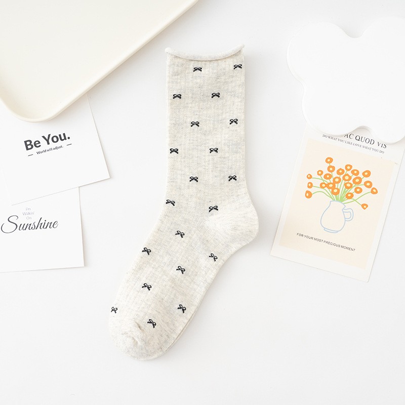 Chaussettes longueur mi-mollet avec nœud JOSSLYN Chaussettes longueur mi-mollet avec nœud JOSSLYN