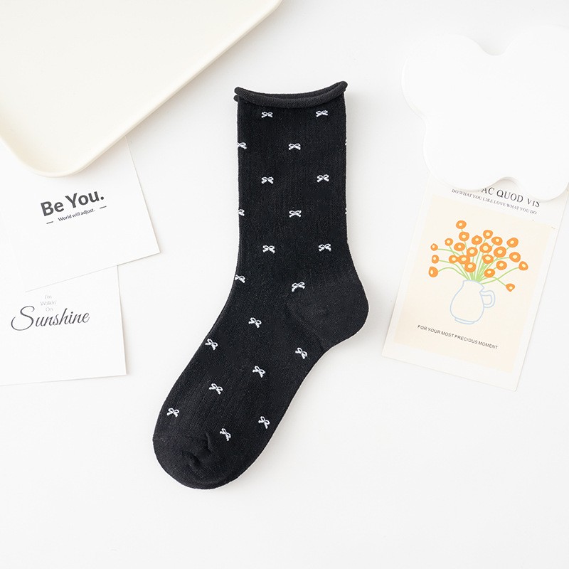 Chaussettes longueur mi-mollet avec nœud JOSSLYN Chaussettes longueur mi-mollet avec nœud JOSSLYN